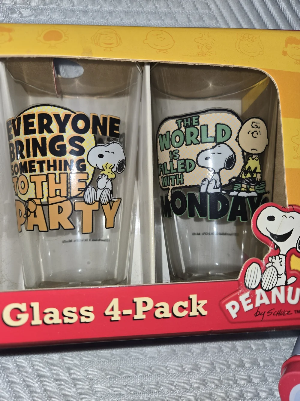 Peanuts Pint Glass 4-Pack — Yellow, Black, Orange, Green Graphics